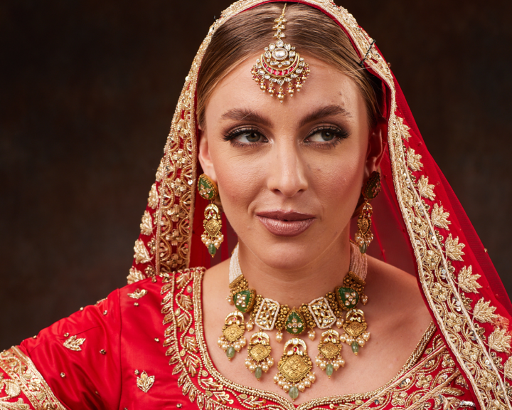 Asian bride wearing gold Polki choker necklace