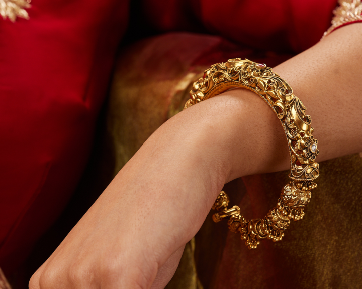 Bridal gold bangle engraved with initials and wedding date